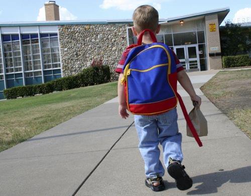  Child walking into school